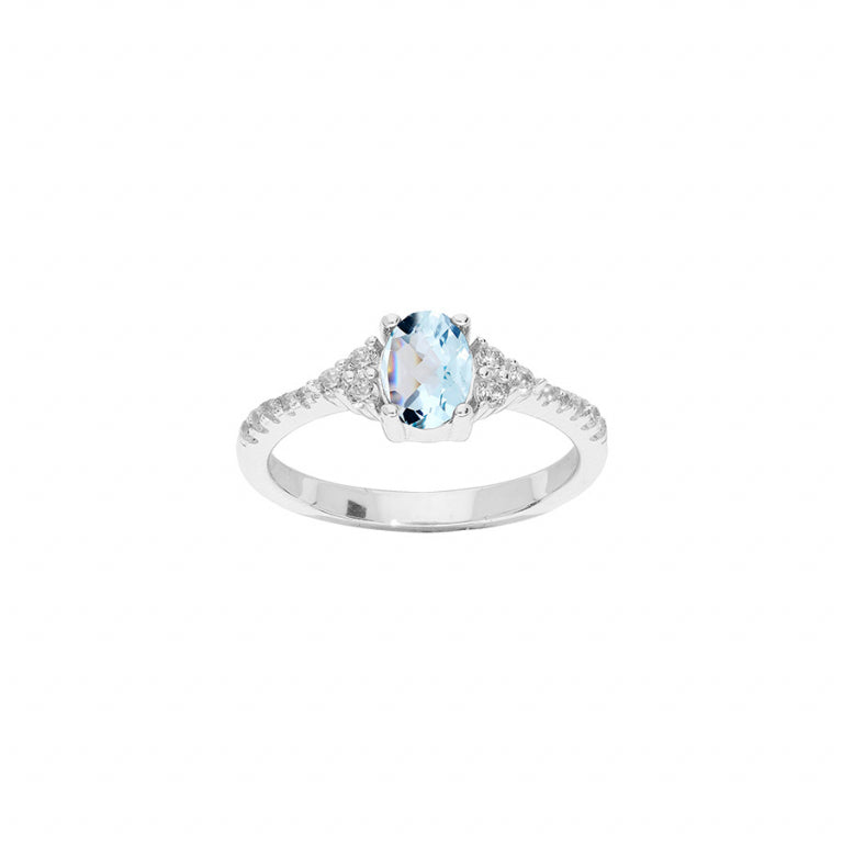 Ringen met blauwe topaas en witte oxiden, gezet in gerhodineerd 925 zilver