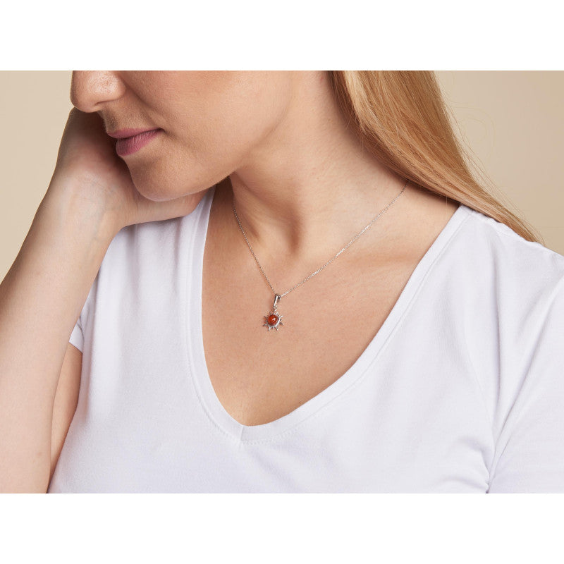 Ciondolo sole in ambra cognac – argento rodiato 925 – ambra naturale del Mar Baltico