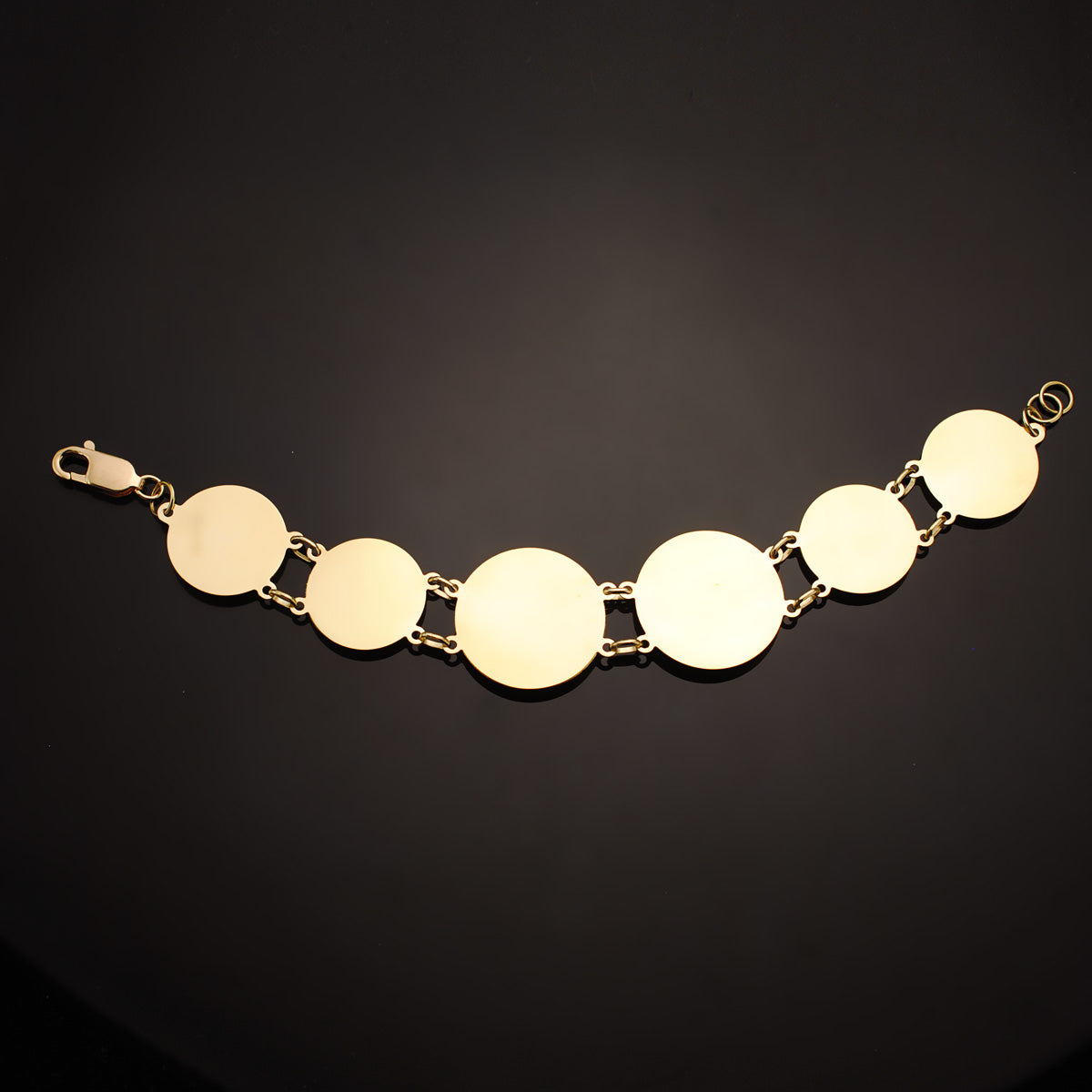 Bransoletka 18-karatowa z 2 złotych meduz 25 i 20 mm Długość 20,5 cm