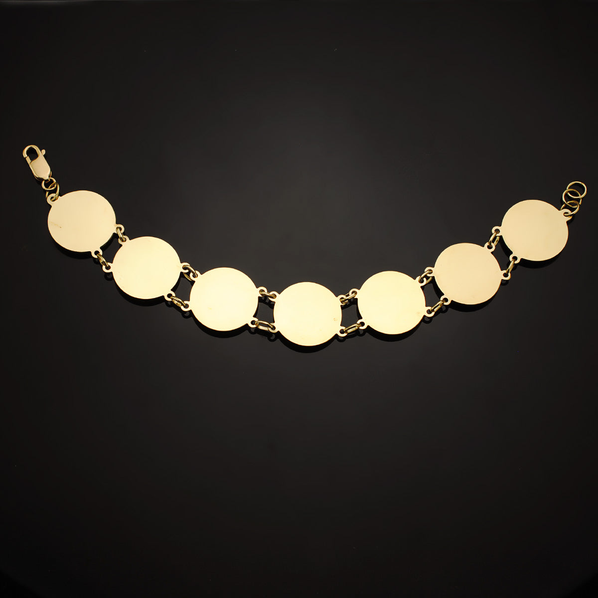 Bransoletka 18-karatowa z 2 genialnych okrągłych złotych meduz. 20 mm Długość 21,5 cm