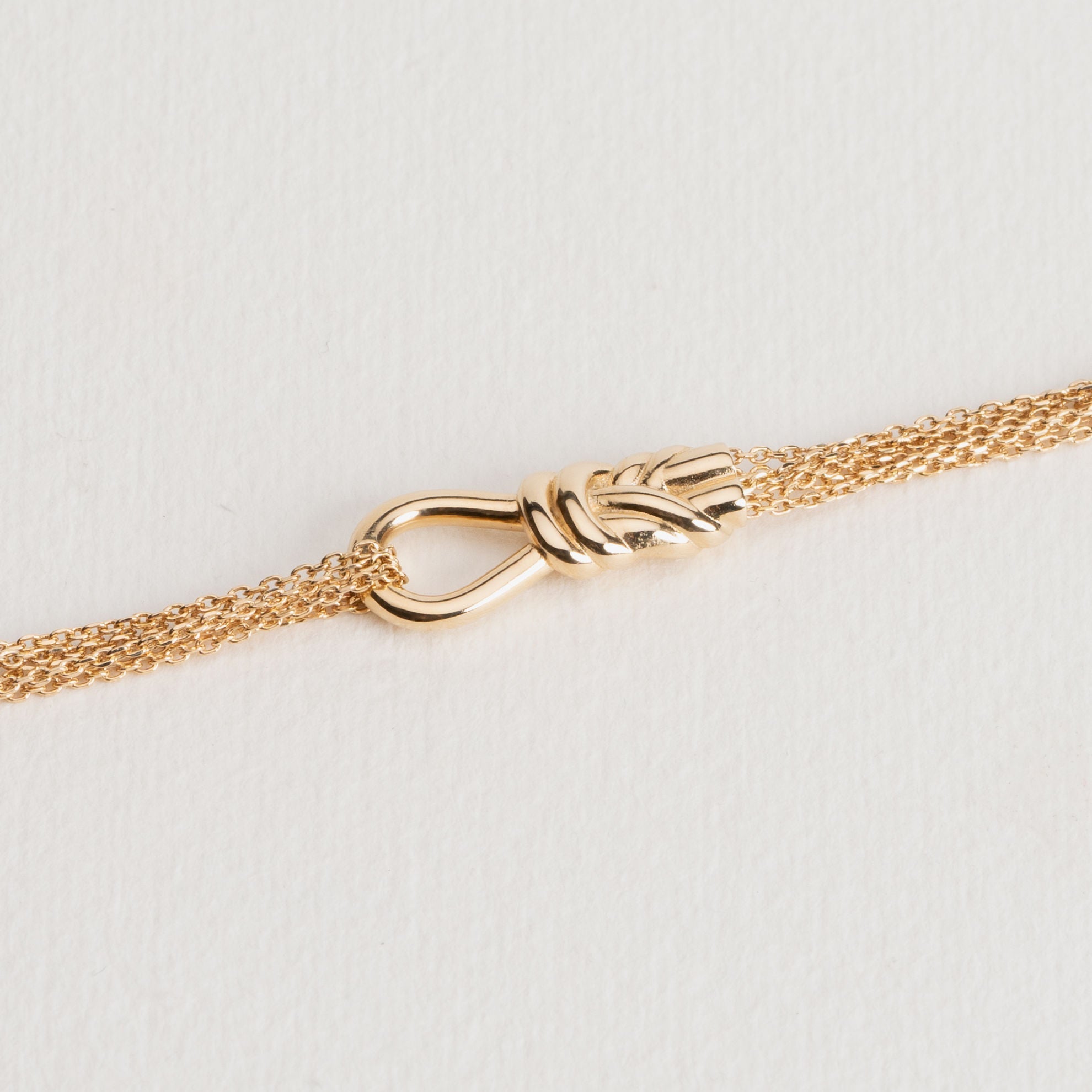Bracelet chaine Kelly en plaqué or détail nœud signature