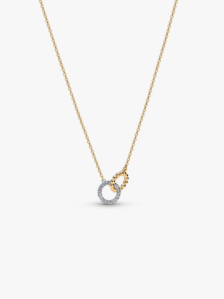 In elkaar grijpende cirkels, Pavé en bimateriaal bollen ketting