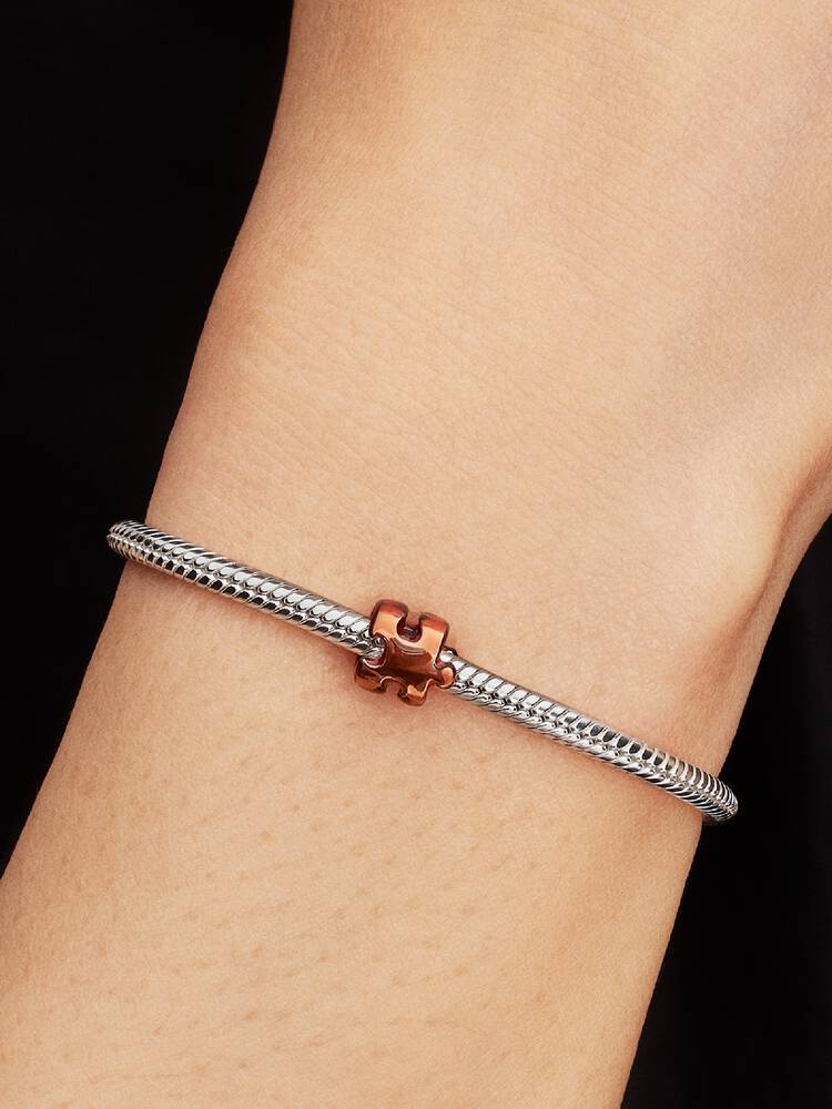 Mini ciondolo pezzo di puzzle arancione argento | Pandora