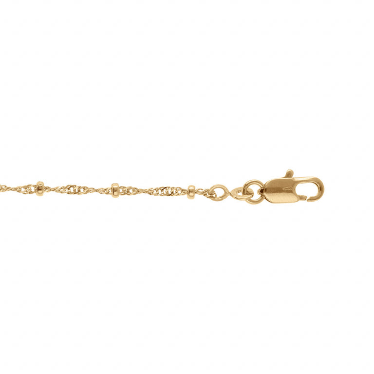 Bracelet twist et boules en plaqué or détail motif et texture