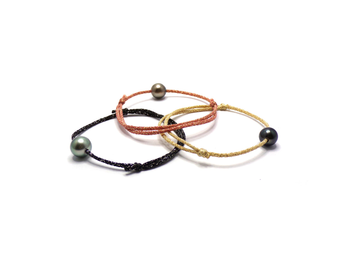 Oval metallisk tahitisk pärlsnöre armband – Cupro och polyester sladd