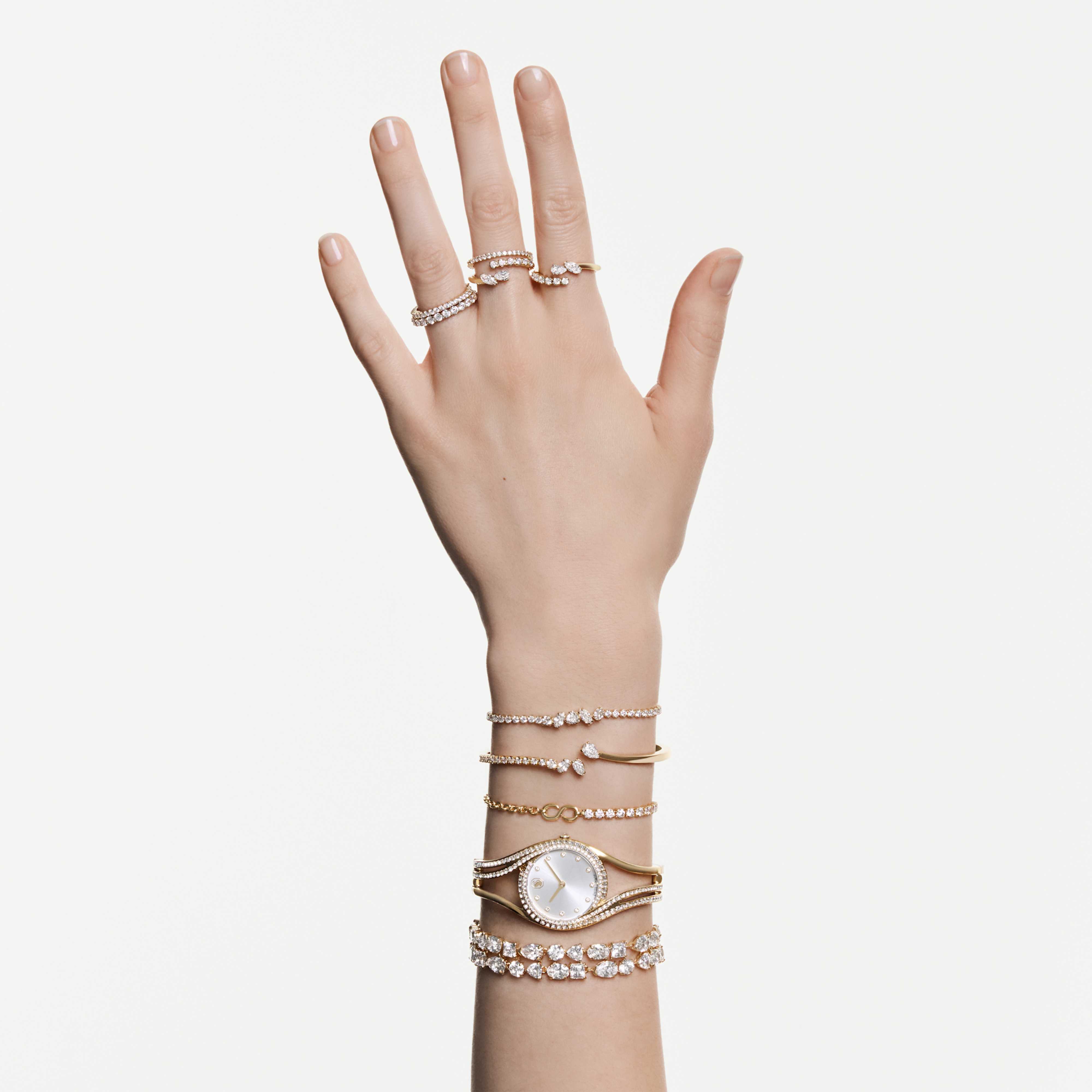 Bracelet Swarovski - Mesmera Attract - Blanc & Doré sur un mannequin